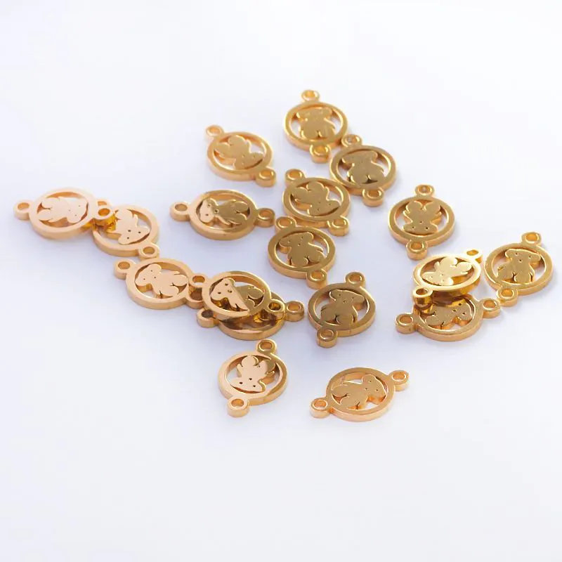 Łącznik ze stali chirurgicznej miś w kółku w kolorze złotym 11,8 mm [ST8907B]