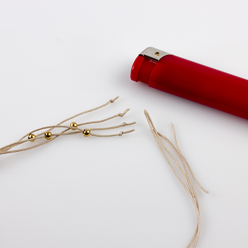 bransoletka z muszelek kauri