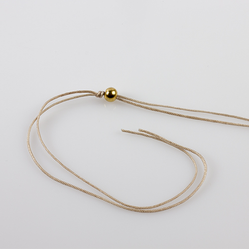 bransoletka z muszelek kauri