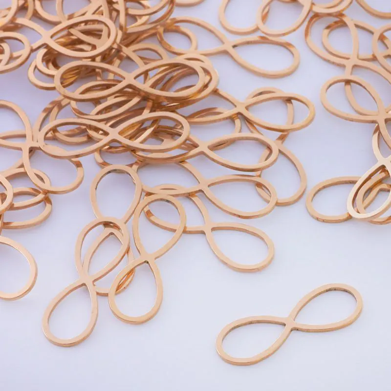 Baza geometryczna ze stali chirurgicznej znak nieskończoności w kolorze złotym 26x9mm [ST2502B]