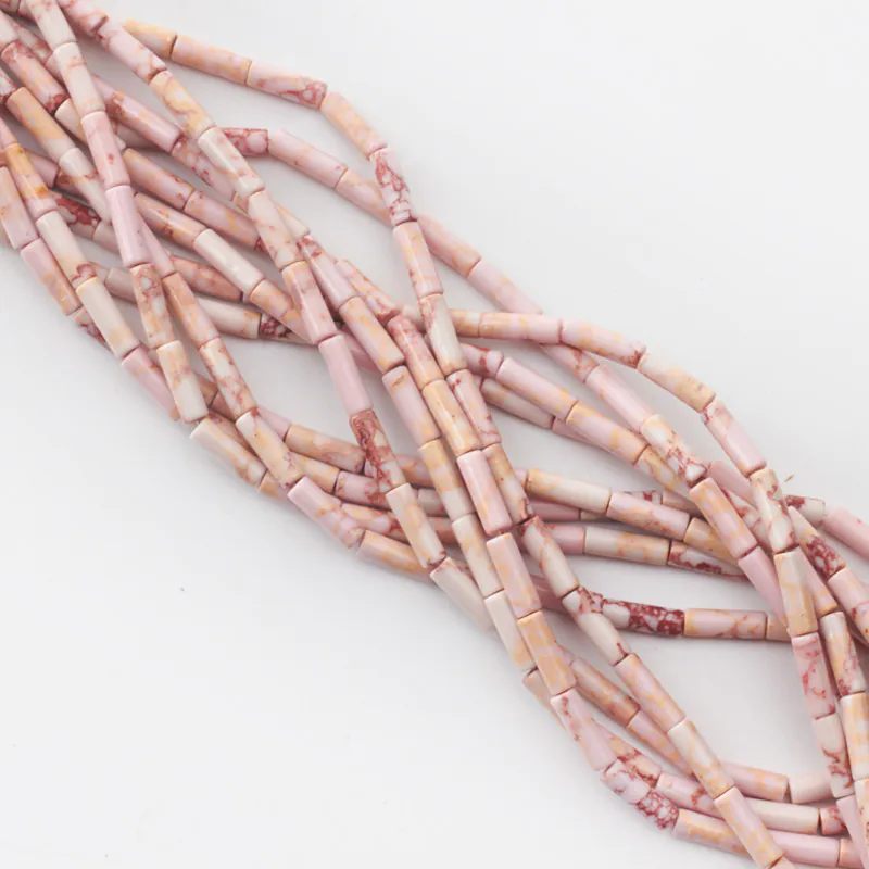 Koraliki jaspis cesarski słupek okrągły różowy 13x4,5 mm [KA1307]